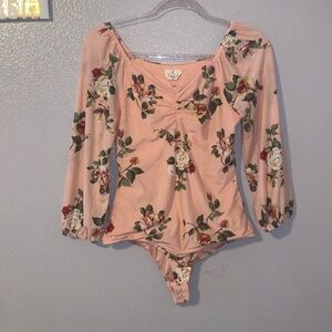 Ember light pink floral cinched long sleeve bodysuit
